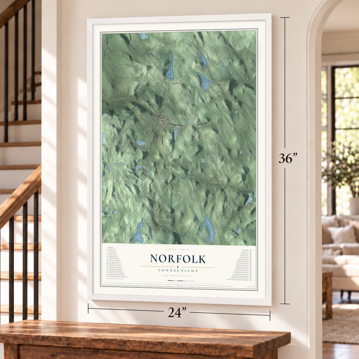 Norfolk, Connecticut map, 24 x 36 inch print in a white frame by a staircase