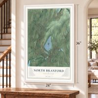 North Branford, Connecticut map, 24 x 36 inch print in a white frame by a staircase