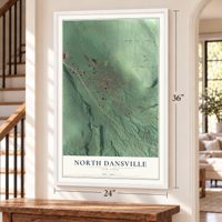 North Dansville, New York map, 24 x 36 inch print in a white frame by a staircase