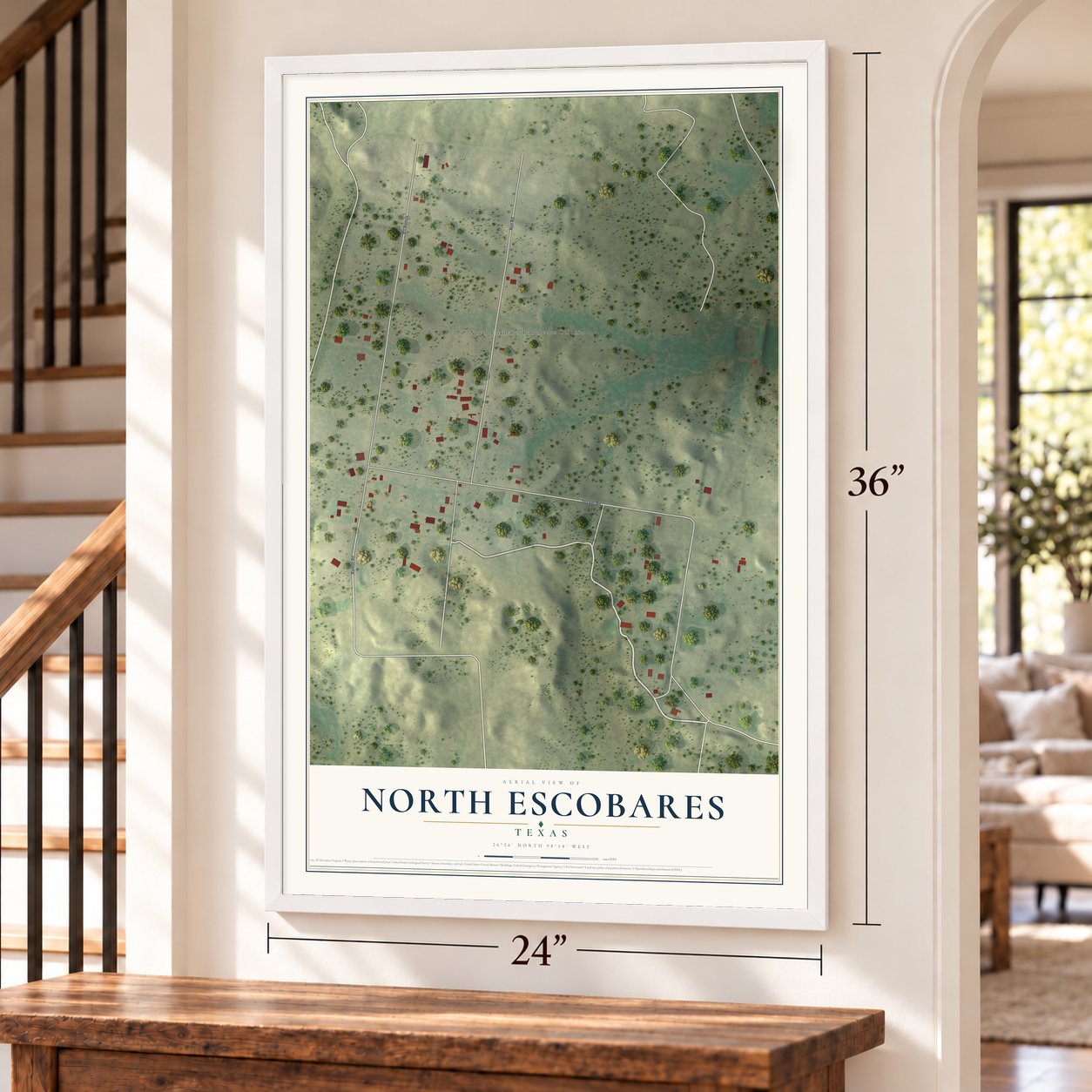 North Escobares, Texas map, 24 x 36 inch print in a white frame by a staircase