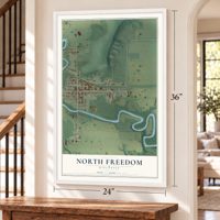 North Freedom, Wisconsin map, 24 x 36 inch print in a white frame by a staircase