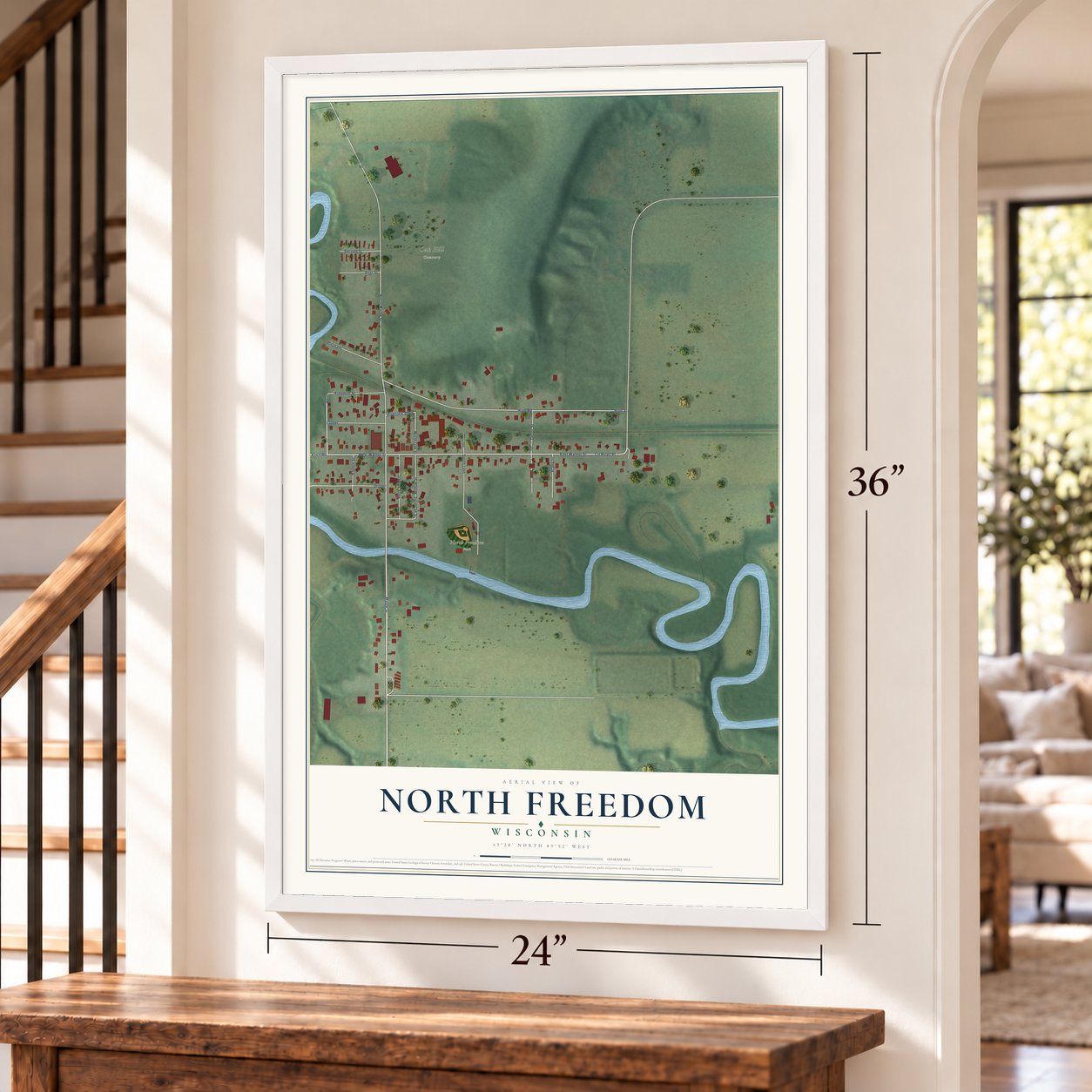 North Freedom, Wisconsin map, 24 x 36 inch print in a white frame by a staircase