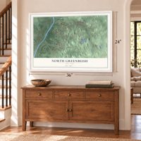 North Greenbush, New York map, 24 x 36 inch print in a white frame above a dresser by a staircase
