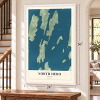 North Hero, Vermont map, 24 x 36 inch print in a white frame by a staircase