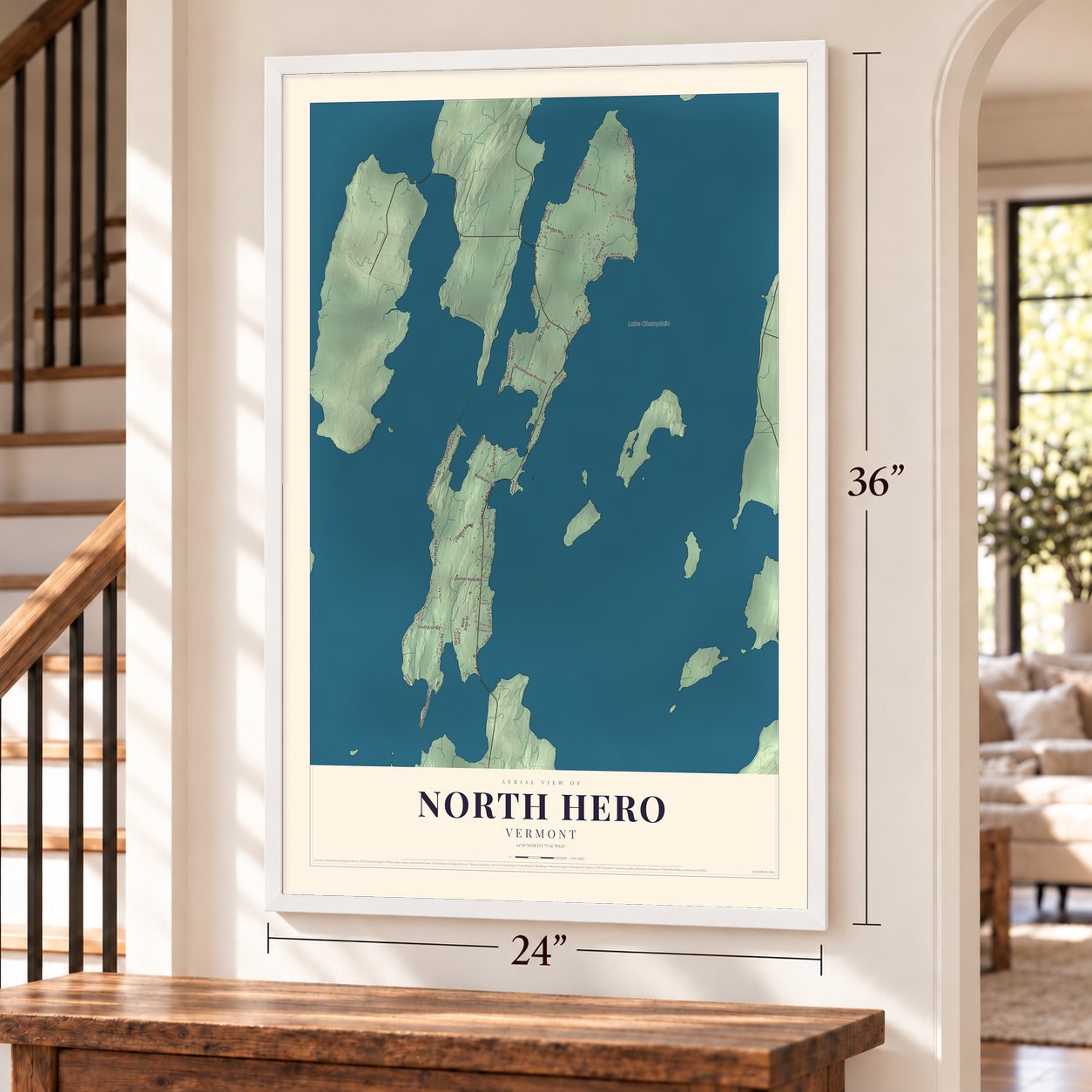 North Hero, Vermont map, 24 x 36 inch print in a white frame by a staircase