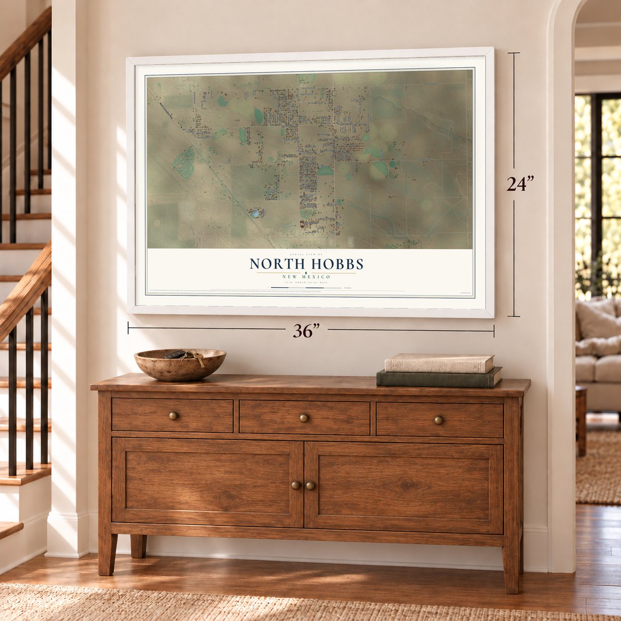 North Hobbs, New Mexico map, 24 x 36 inch print in a white frame above a dresser by a staircase