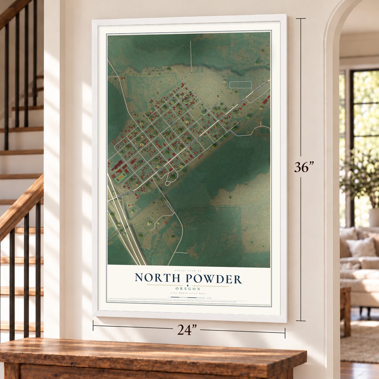 North Powder, Oregon map, 24 x 36 inch print in a white frame by a staircase