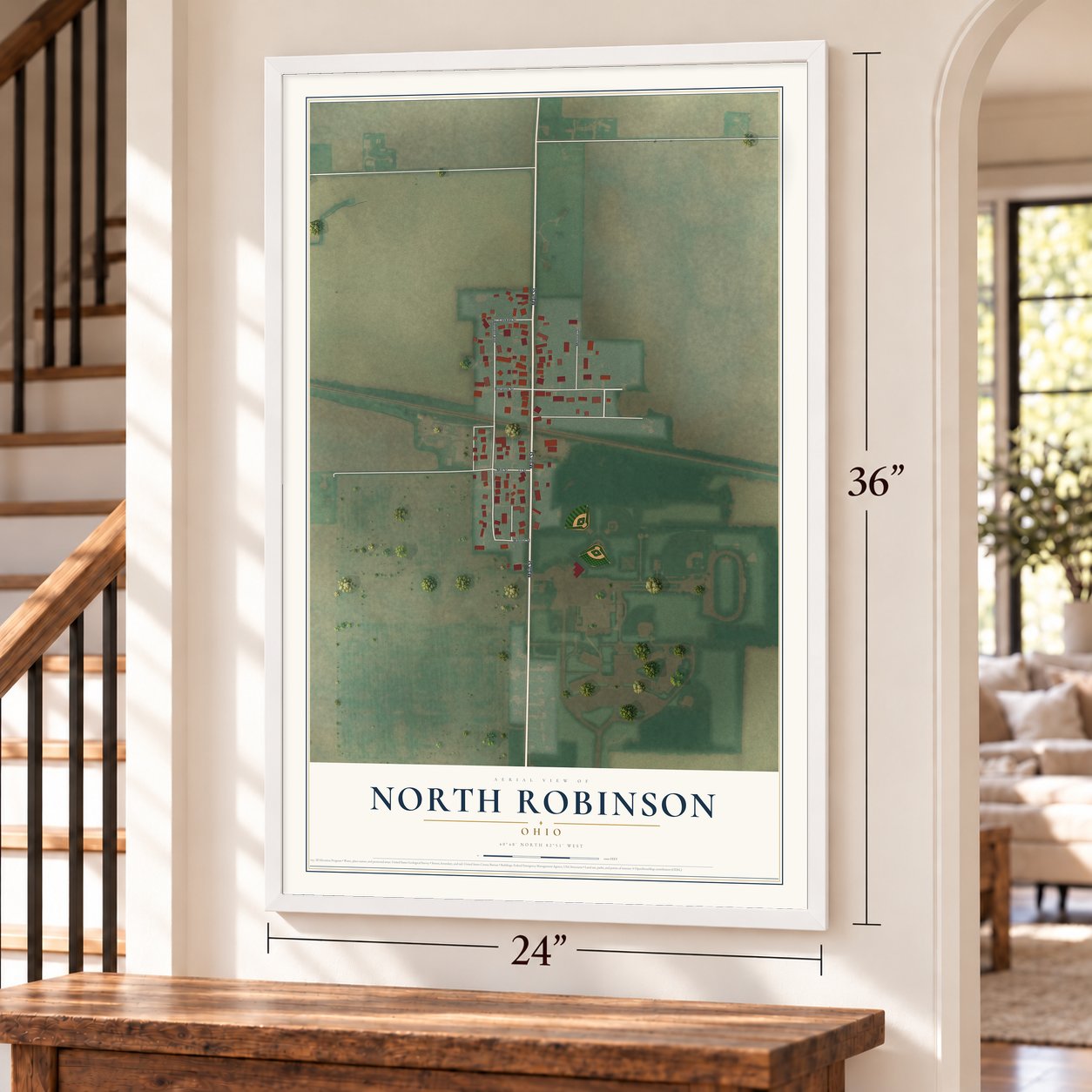 North Robinson, Ohio map, 24 x 36 inch print in a white frame by a staircase