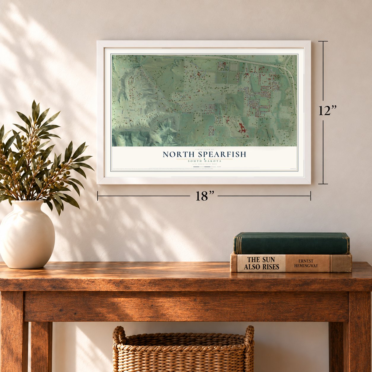North Spearfish, South Dakota map, 12 x 18 inch print in a white frame in an entryway