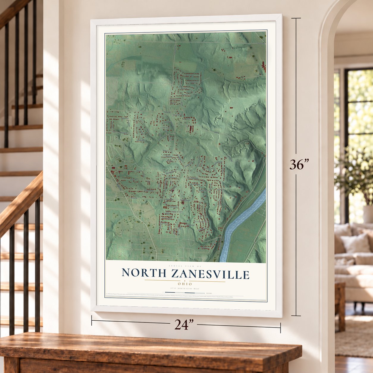 North Zanesville, Ohio map, 24 x 36 inch print in a white frame by a staircase