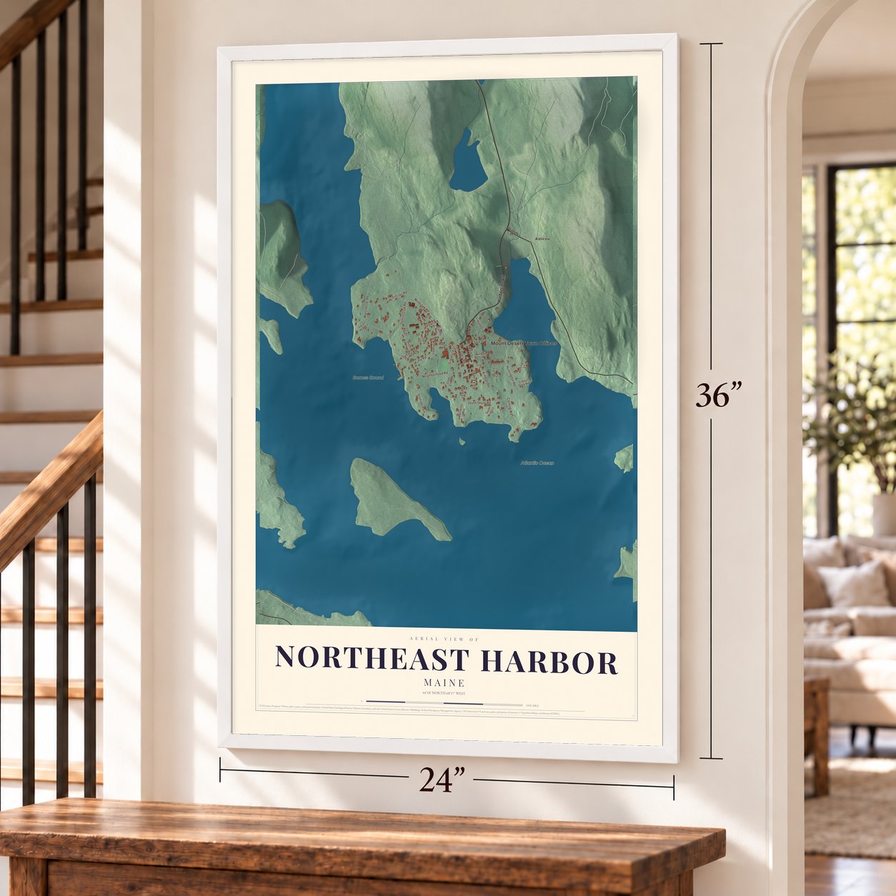 Northeast Harbor, Maine map, 24 x 36 inch print in a white frame by a staircase