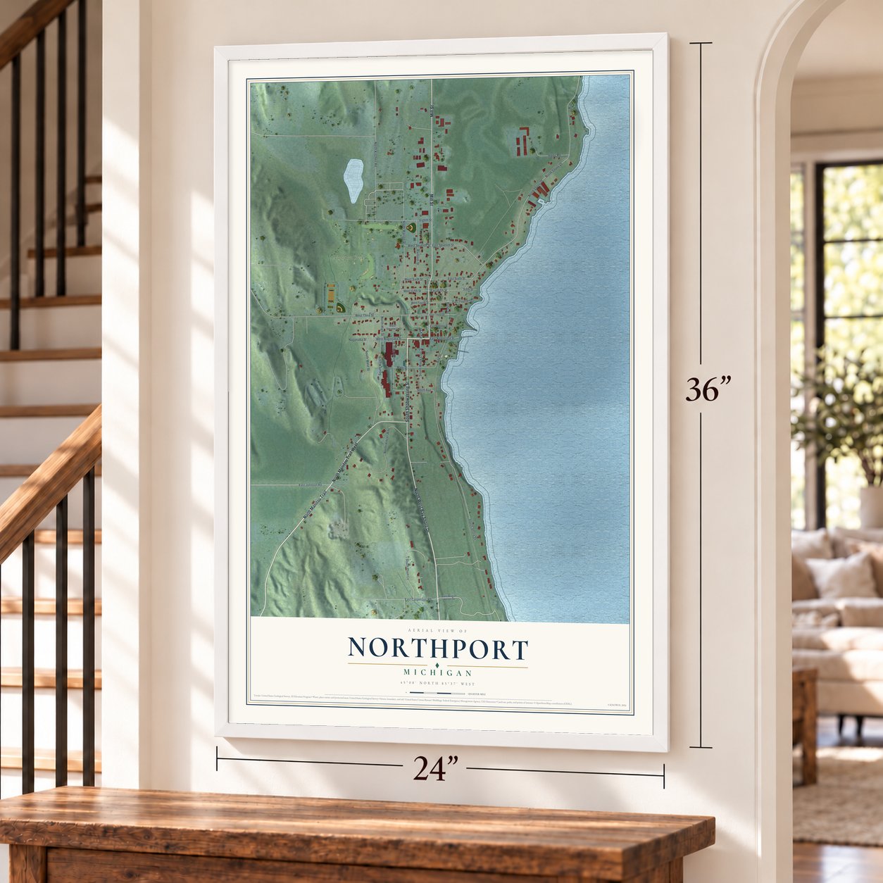 Northport, Michigan map, 24 x 36 inch print in a white frame by a staircase