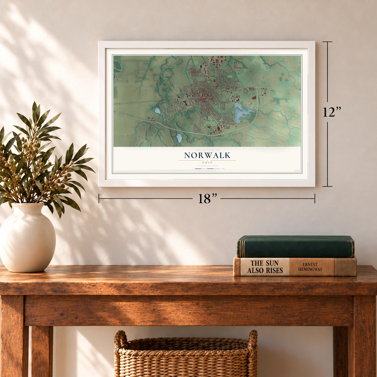 Norwalk, Ohio map, 12 x 18 inch print in a white frame in an entryway
