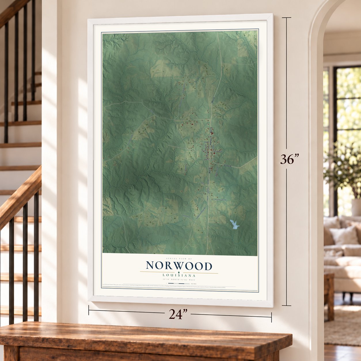 Norwood, Louisiana map, 24 x 36 inch print in a white frame by a staircase