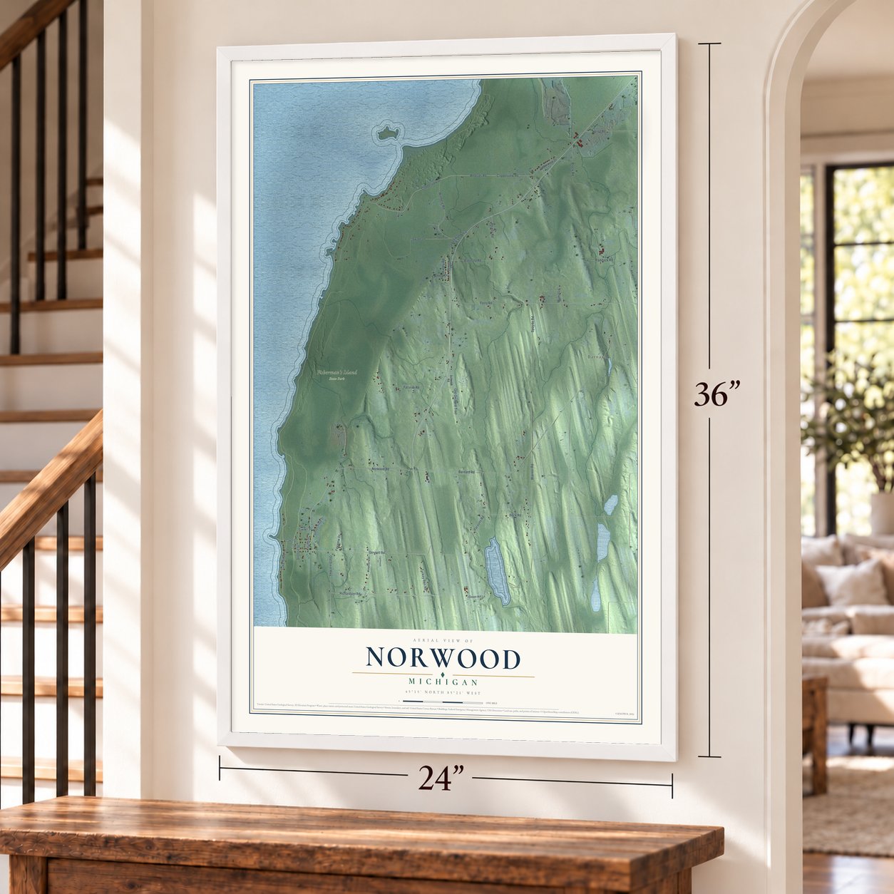 Norwood, Michigan map, 24 x 36 inch print in a white frame by a staircase