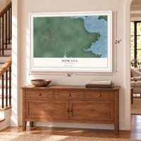 Nowata, Oklahoma map, 24 x 36 inch print in a white frame above a dresser by a staircase