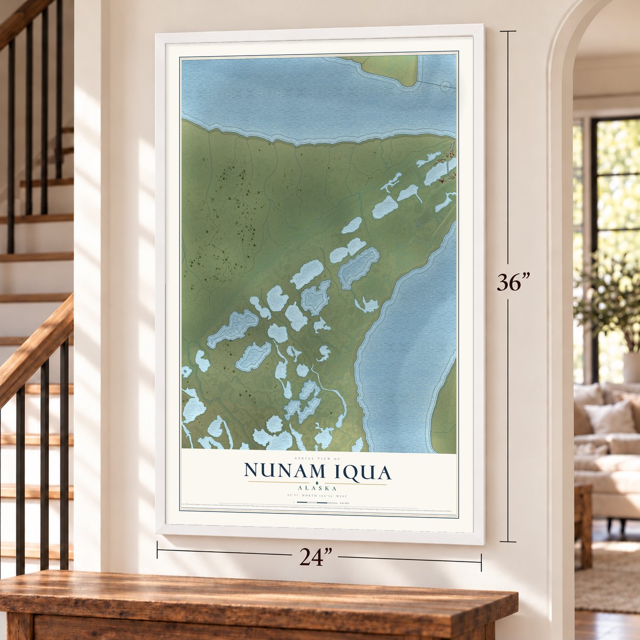 Nunam Iqua, Alaska map, 24 x 36 inch print in a white frame by a staircase