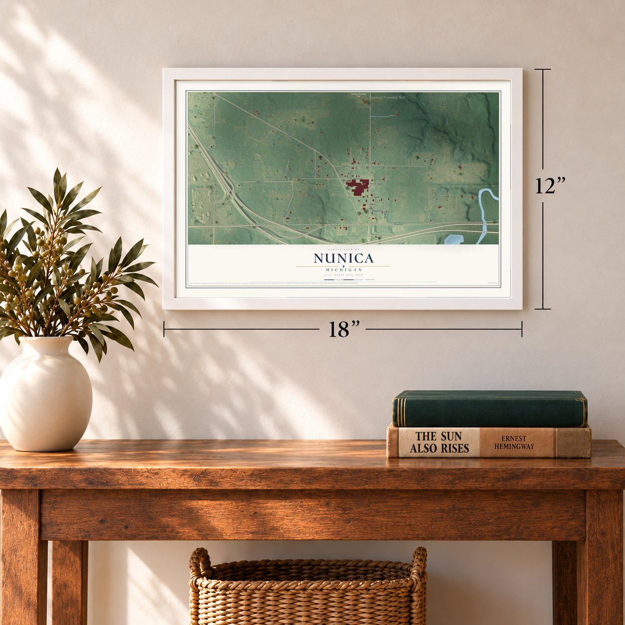 Nunica, Michigan map, 12 x 18 inch print in a white frame in an entryway