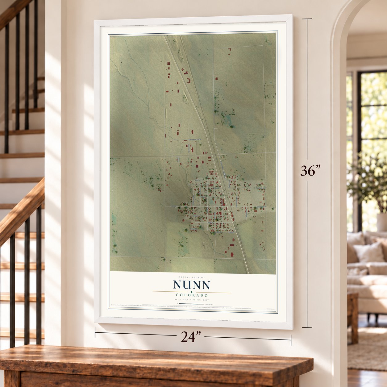 Nunn, Colorado map, 24 x 36 inch print in a white frame by a staircase