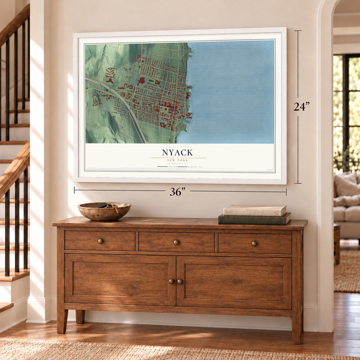 Nyack, New York map, 24 x 36 inch print in a white frame above a dresser by a staircase