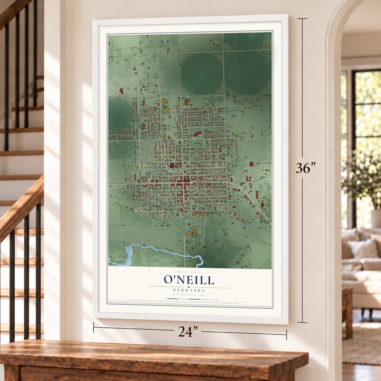 O'Neill, Nebraska map, 24 x 36 inch print in a white frame by a staircase