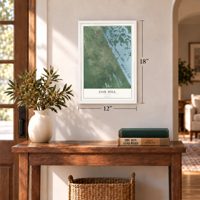 Oak Hill, Florida map, 12 x 18 inch print in a white frame in an entryway