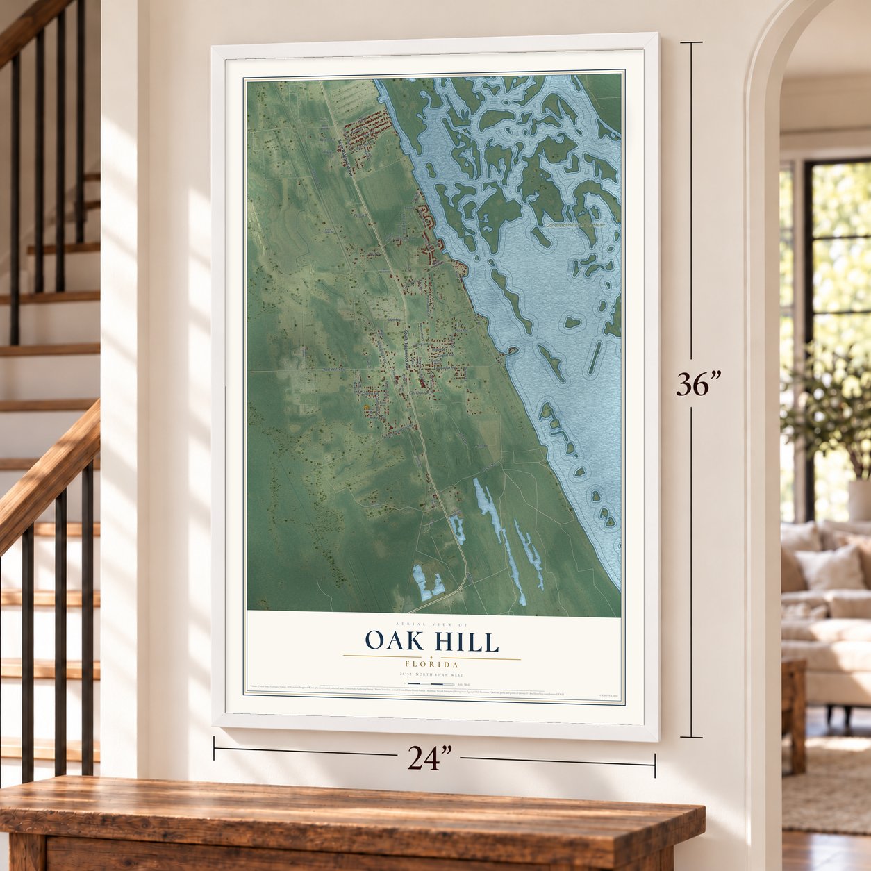 Oak Hill, Florida map, 24 x 36 inch print in a white frame by a staircase