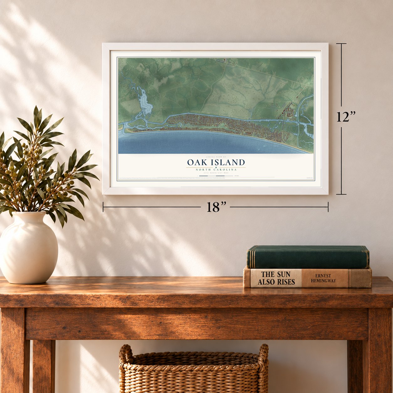 Oak Island, North Carolina map, 12 x 18 inch print in a white frame in an entryway