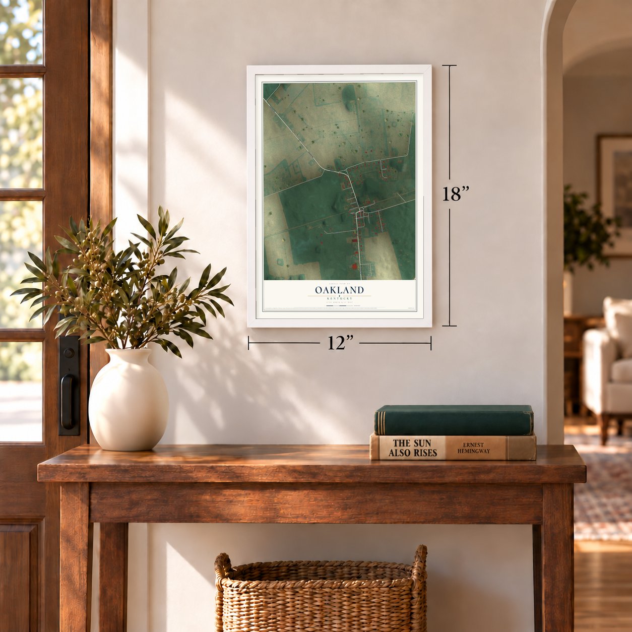 Oakland, Kentucky map, 12 x 18 inch print in a white frame in an entryway