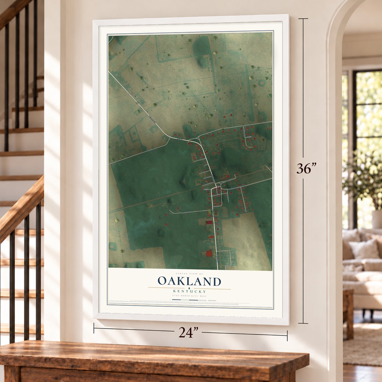 Oakland, Kentucky map, 24 x 36 inch print in a white frame by a staircase