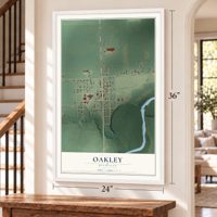 Oakley, Michigan map, 24 x 36 inch print in a white frame by a staircase