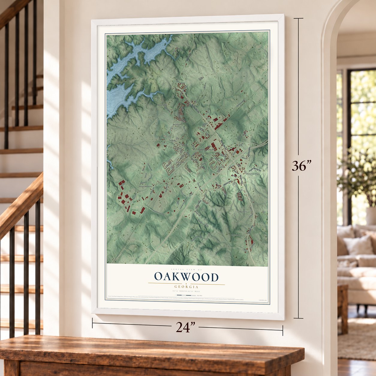 Oakwood, Georgia map, 24 x 36 inch print in a white frame by a staircase