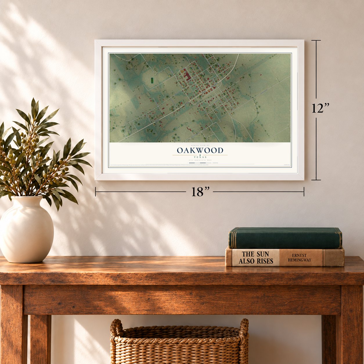 Oakwood, Texas map, 12 x 18 inch print in a white frame in an entryway