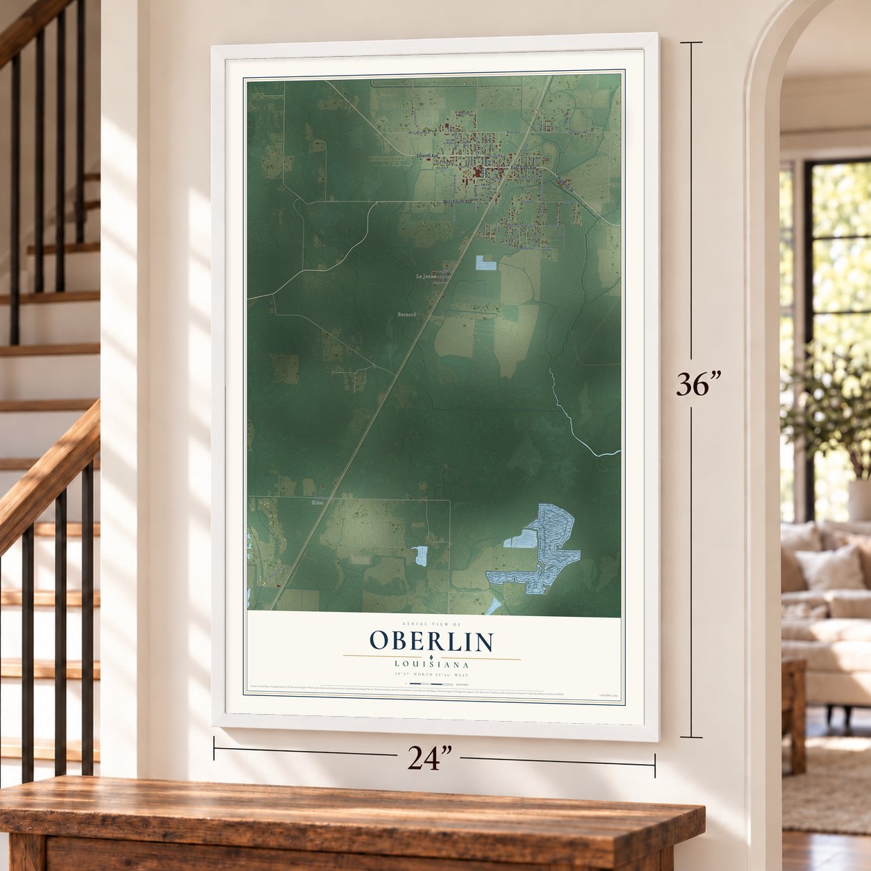 Oberlin, Louisiana map, 24 x 36 inch print in a white frame by a staircase