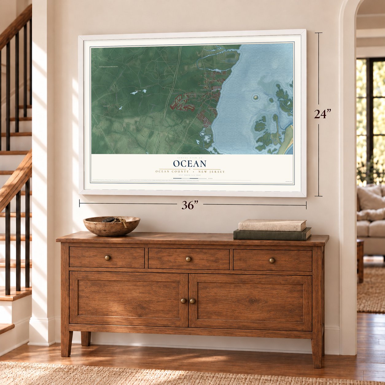 Ocean, Ocean County, New Jersey map, 24 x 36 inch print in a white frame above a dresser by a staircase