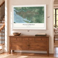 Ocean Springs, Mississippi map, 24 x 36 inch print in a white frame above a dresser by a staircase