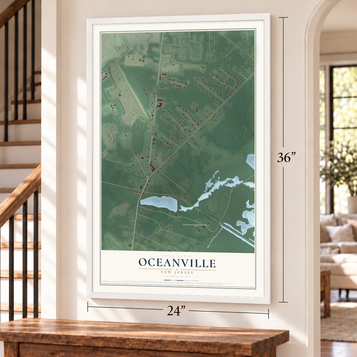 Oceanville, New Jersey map, 24 x 36 inch print in a white frame by a staircase