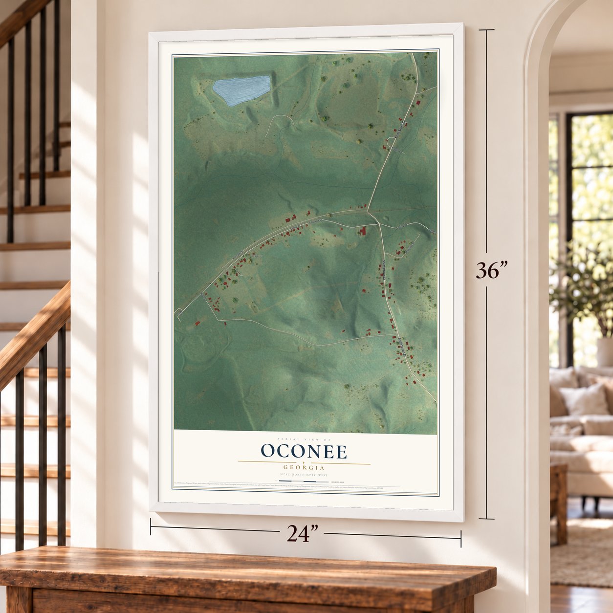 Oconee, Georgia map, 24 x 36 inch print in a white frame by a staircase