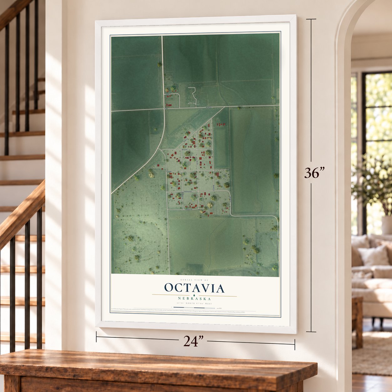 Octavia, Nebraska map, 24 x 36 inch print in a white frame by a staircase