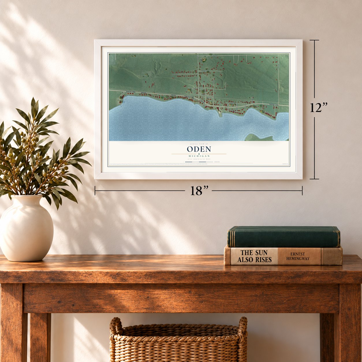Oden, Michigan map, 12 x 18 inch print in a white frame in an entryway