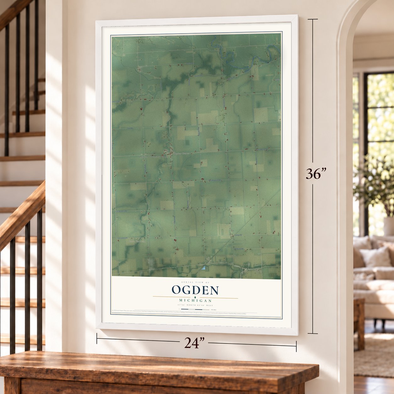 Ogden, Michigan map, 24 x 36 inch print in a white frame by a staircase