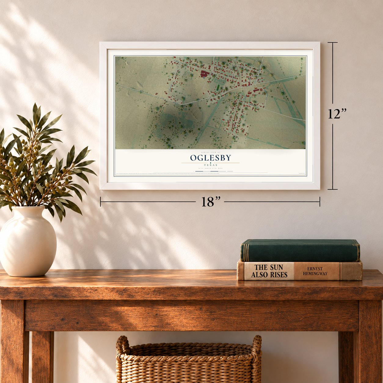 Oglesby, Texas map, 12 x 18 inch print in a white frame in an entryway
