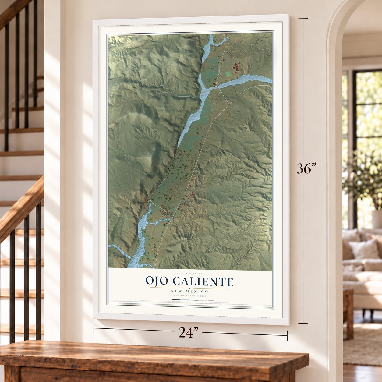 Ojo Caliente, New Mexico map, 24 x 36 inch print in a white frame by a staircase