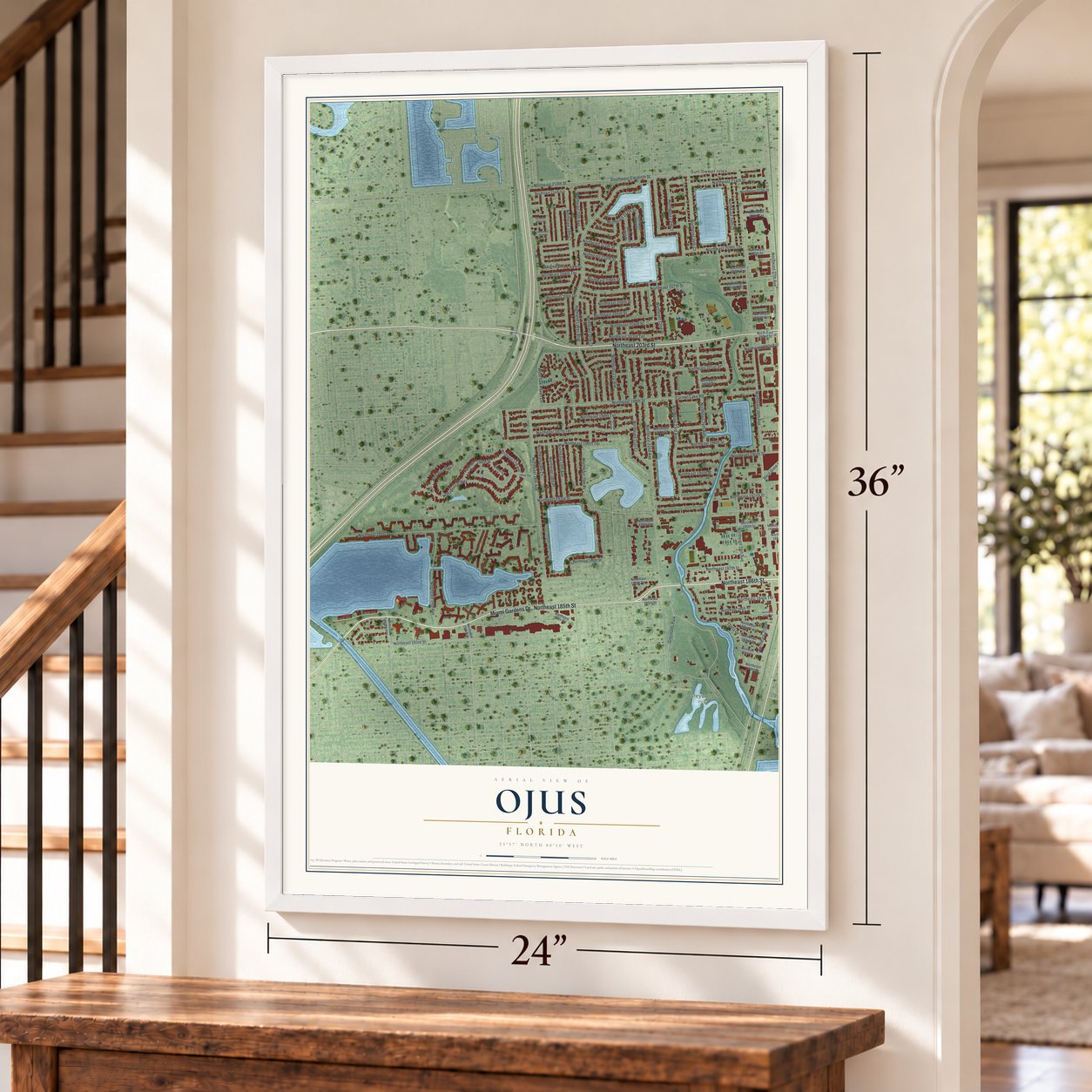 Ojus, Florida map, 24 x 36 inch print in a white frame by a staircase