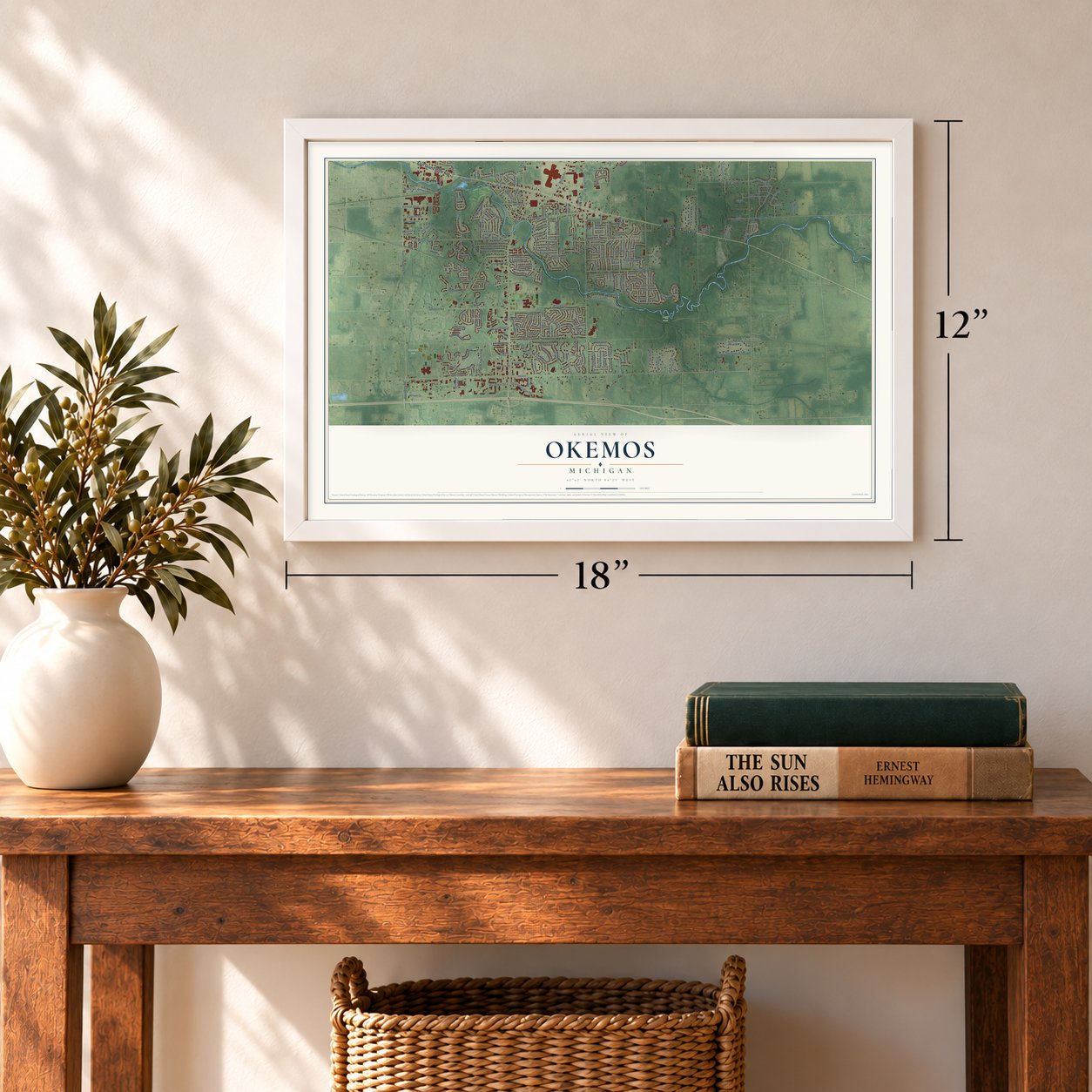 Okemos, Michigan map, 12 x 18 inch print in a white frame in an entryway