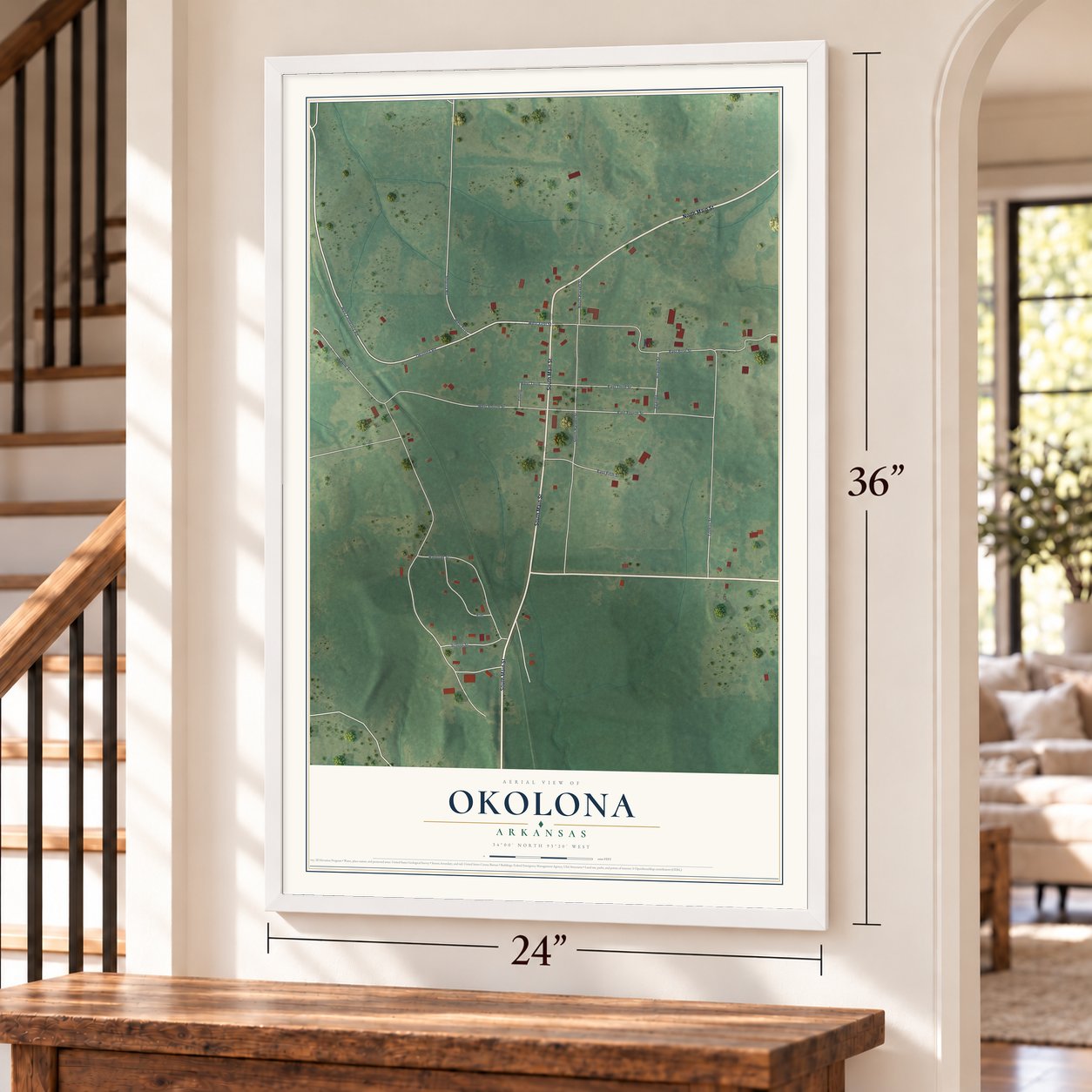 Okolona, Arkansas map, 24 x 36 inch print in a white frame by a staircase