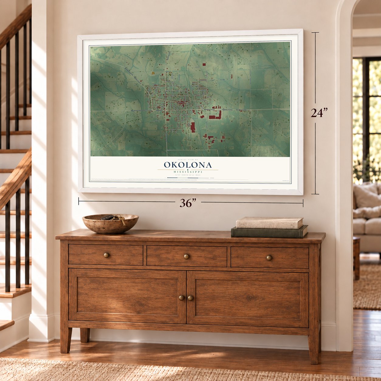 Okolona, Mississippi map, 24 x 36 inch print in a white frame above a dresser by a staircase