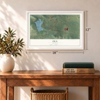 Ola, Arkansas map, 12 x 18 inch print in a white frame in an entryway