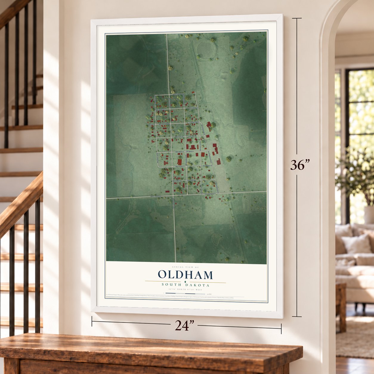Oldham, South Dakota map, 24 x 36 inch print in a white frame by a staircase
