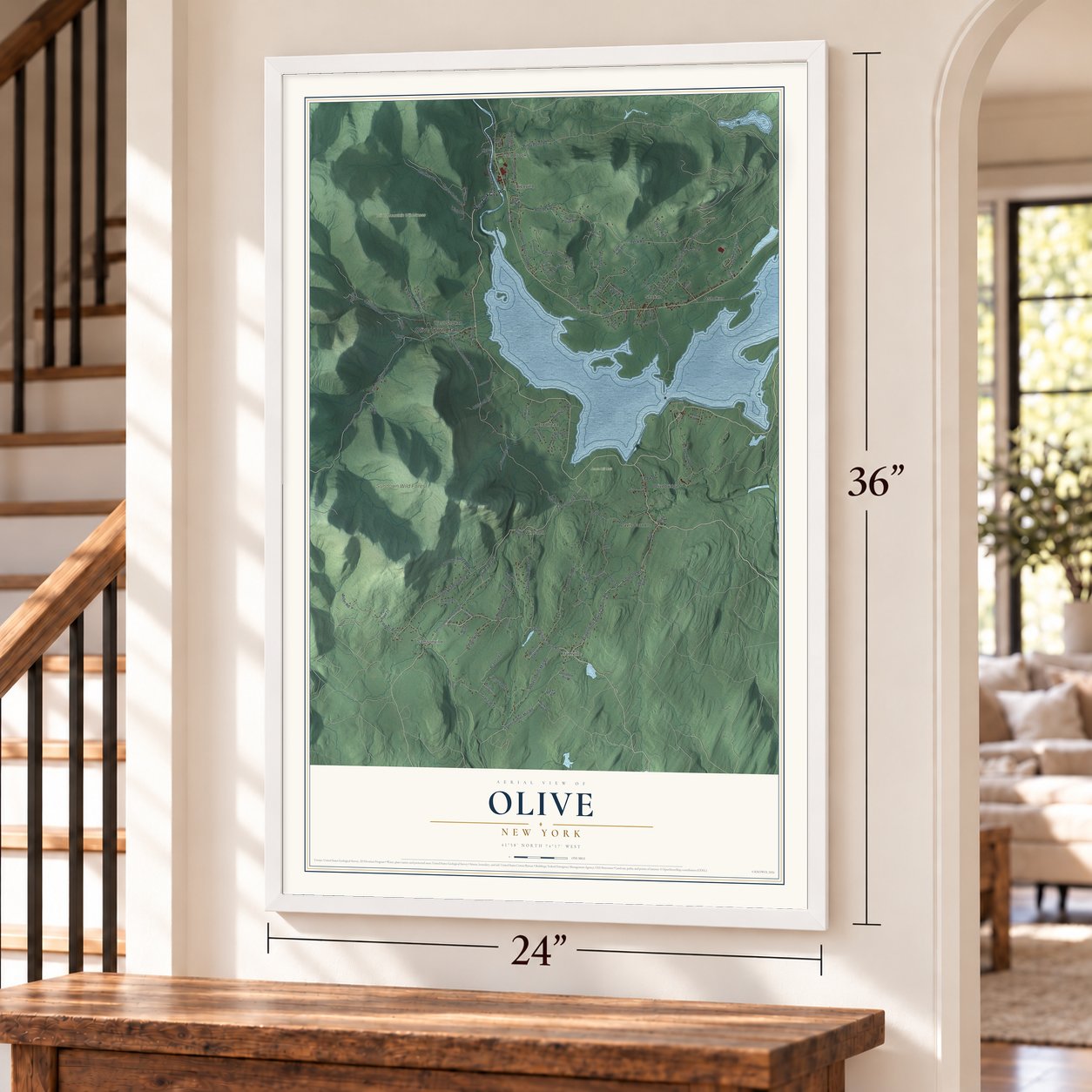 Olive, New York map, 24 x 36 inch print in a white frame by a staircase